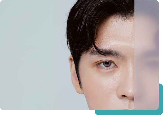 얼굴 반쪽에 블러처리가 된 남성의 얼굴정면